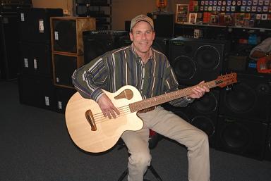 Ed Brigham And His New Tacoma 5 String.jpg