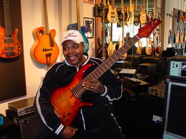 Doc Samuels Picking Up A 6 String BN6 F Bass.jpg