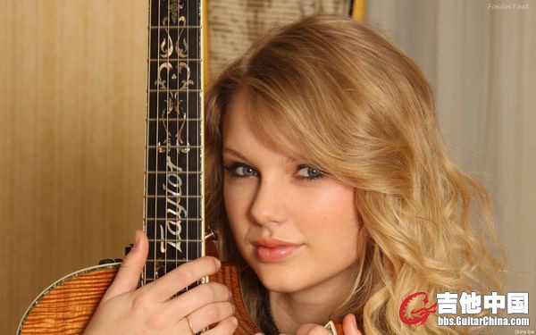 taylor-swift-con-guitarra-1407-1920x1200.jpg